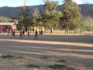 The boys playing soccer