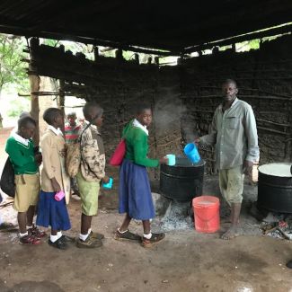 Queuing_up_for_maize_gruel_breakfast