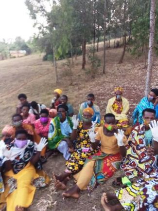 Local ladies masked and gloved